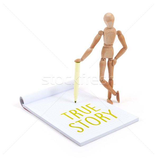 Wooden mannequin writing - True story Stock photo © michaklootwijk