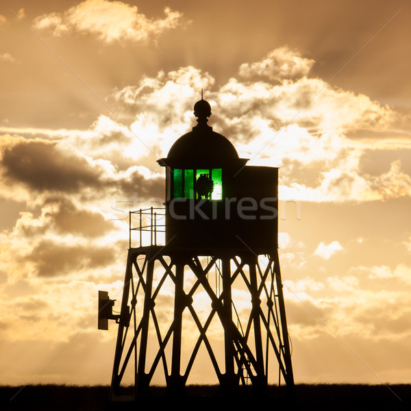 Silhouet groene baken nederlands kust zonsondergang Stockfoto © michaklootwijk