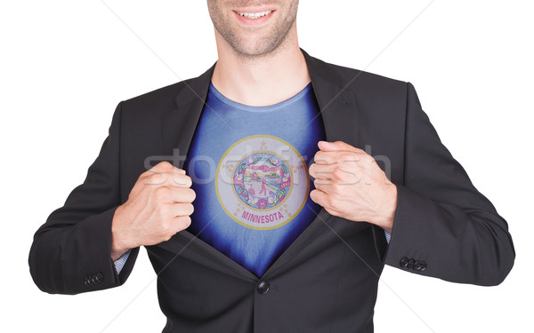 Businessman opening suit to reveal shirt with state flag Stock photo © michaklootwijk