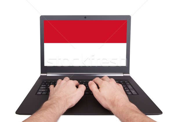 Hands working on laptop, Indonesia Stock photo © michaklootwijk
