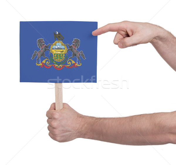 Kéz tart kicsi kártya zászló Pennsylvania Stock fotó © michaklootwijk