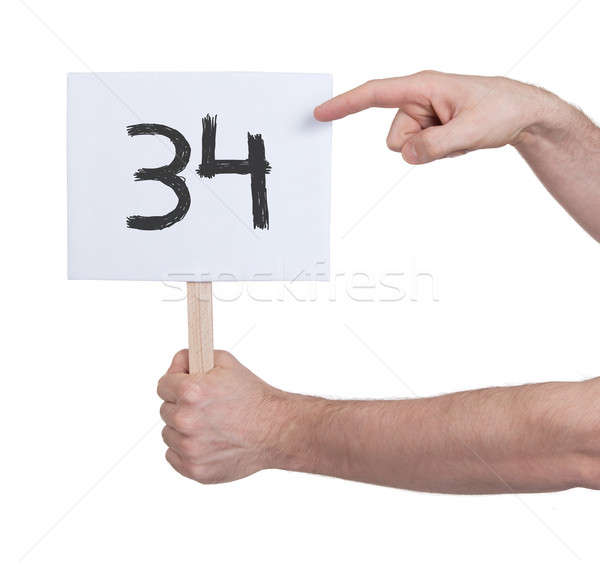 Sign with a number, 34 Stock photo © michaklootwijk