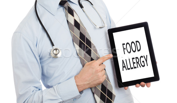 Arzt halten Tablet Essen Allergie isoliert Stock foto © michaklootwijk