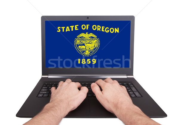 Eller çalışma dizüstü bilgisayar Oregon ekran Stok fotoğraf © michaklootwijk