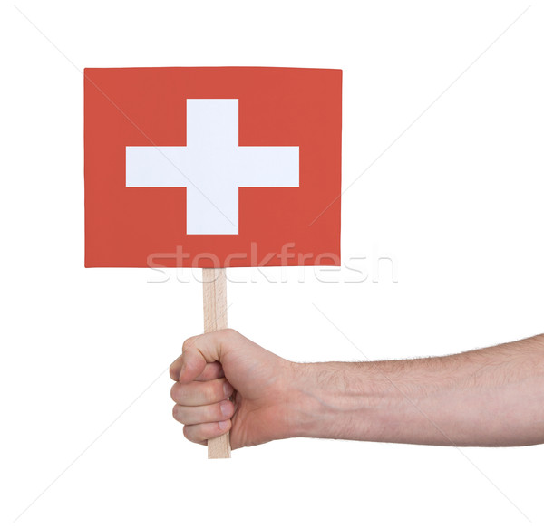 Hand holding small card - Flag of Switzerland Stock photo © michaklootwijk