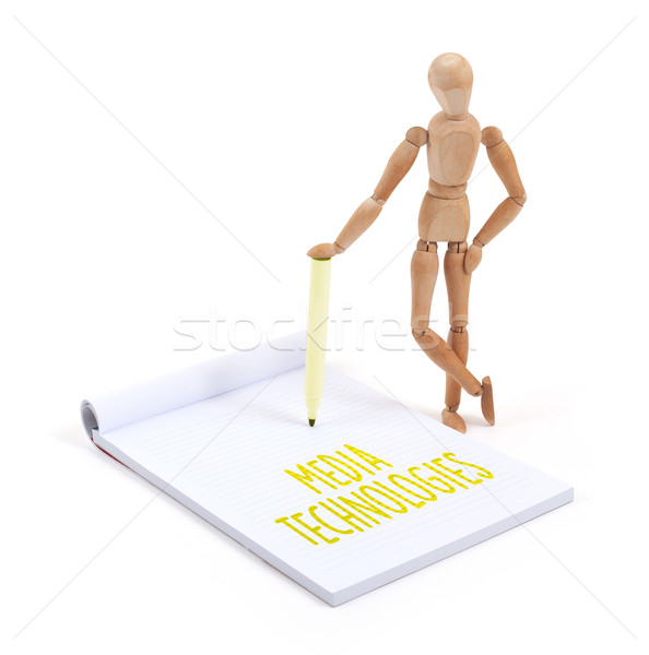 Stock photo: Wooden mannequin writing - Media technologies