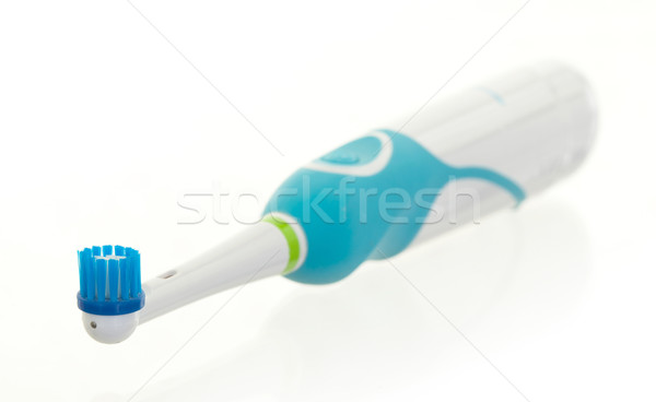 Electric toothbrush isolated Stock photo © michaklootwijk