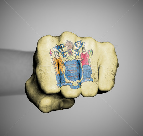 United states, fist with the flag of new jersey Stock photo © michaklootwijk