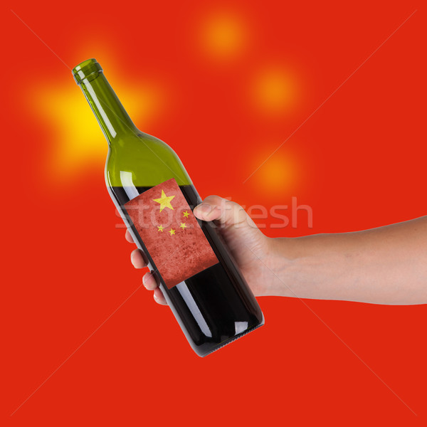 Mão garrafa vinho tinto etiqueta China Foto stock © michaklootwijk