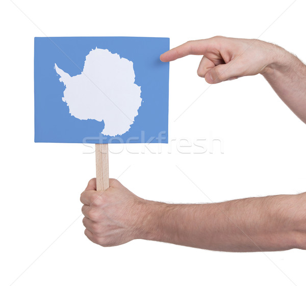 Hand holding small card - Flag of Antarctica Stock photo © michaklootwijk