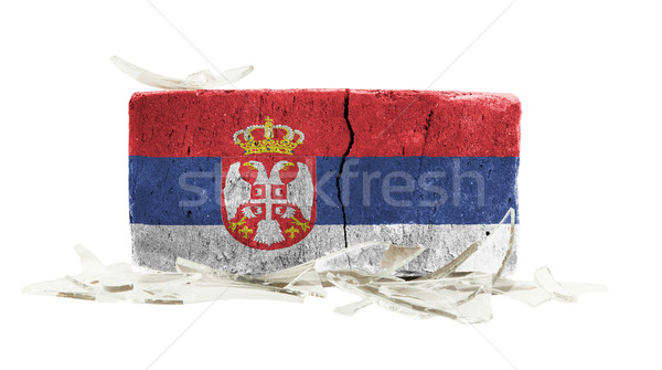 Tijolo cacos de vidro violência bandeira Sérvia parede Foto stock © michaklootwijk