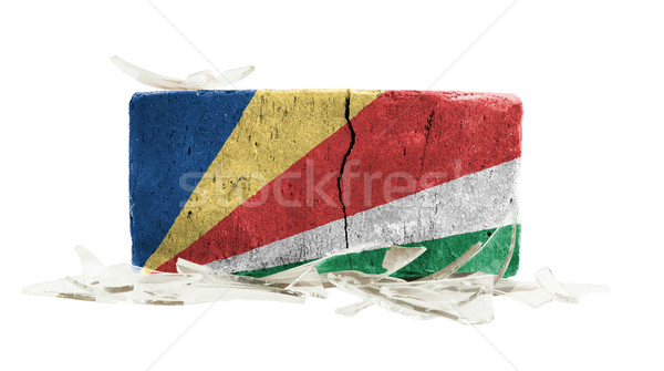 Ladrillo vidrios rotos violencia bandera Seychelles pared Foto stock © michaklootwijk