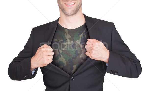 Businessman opening suit to reveal shirt Stock photo © michaklootwijk