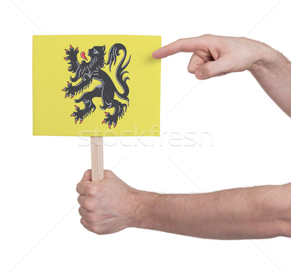 Hand holding small card - Flag of Flanders Stock photo © michaklootwijk