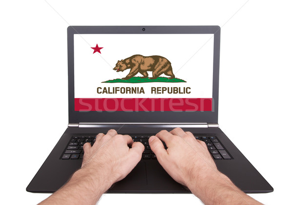 Handen werken laptop Californië tonen scherm Stockfoto © michaklootwijk