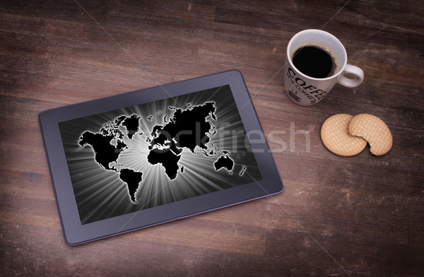 World map on a tablet Stock photo © michaklootwijk