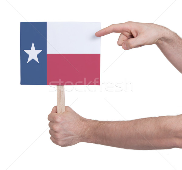 Kéz tart kicsi kártya zászló Texas Stock fotó © michaklootwijk