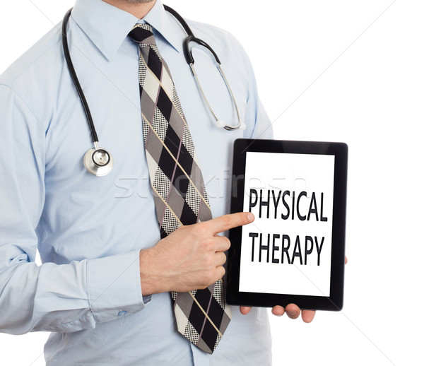Arzt halten Tablet Physiotherapie isoliert weiß Stock foto © michaklootwijk