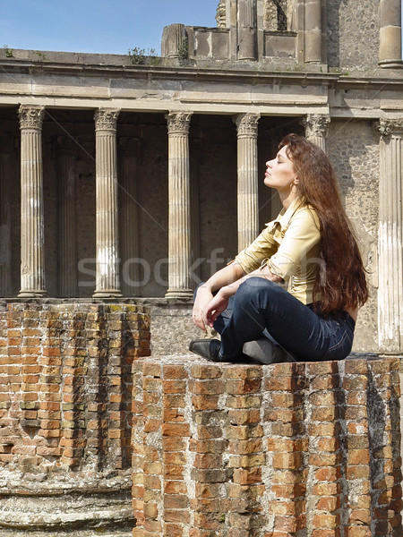 Stock photo: Young woman looking into the light