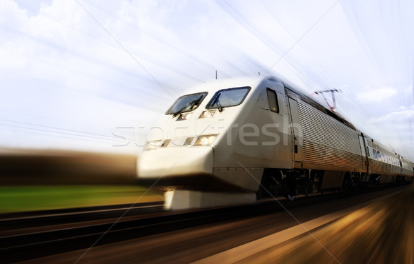 Fast train with motion blur Stock photo © mikdam