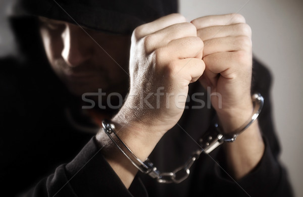 Handcuffed man / Focus this hand Stock photo © mikdam