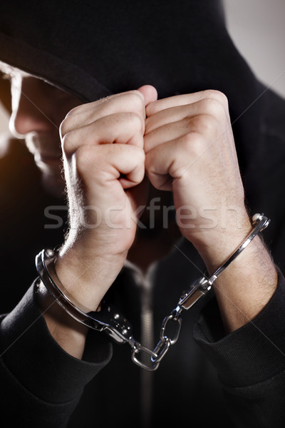 Handcuffed man / Focus this hand Stock photo © mikdam