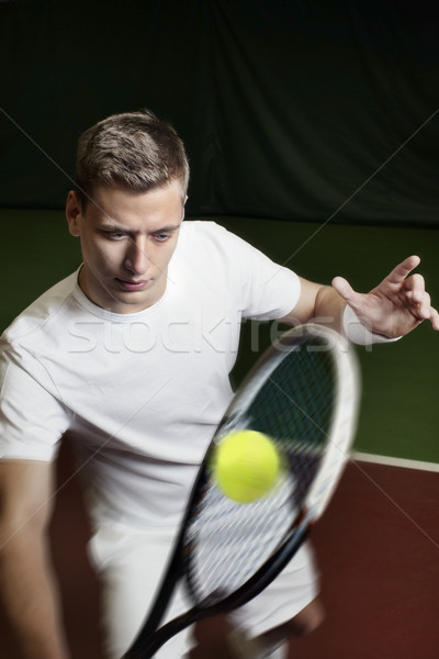 Young man playing tennis Stock photo © mikdam