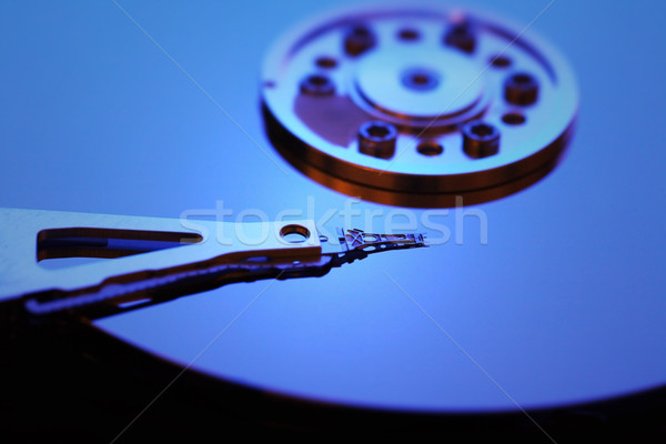 Hard disk detail with a blue light Stock photo © mikdam