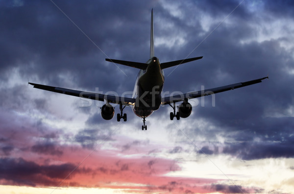   Plane passes overhead Stock photo © mikdam