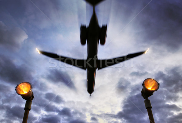  Plane passes overhead Stock photo © mikdam