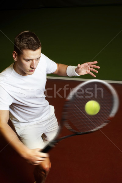 Young man playing tennis Stock photo © mikdam