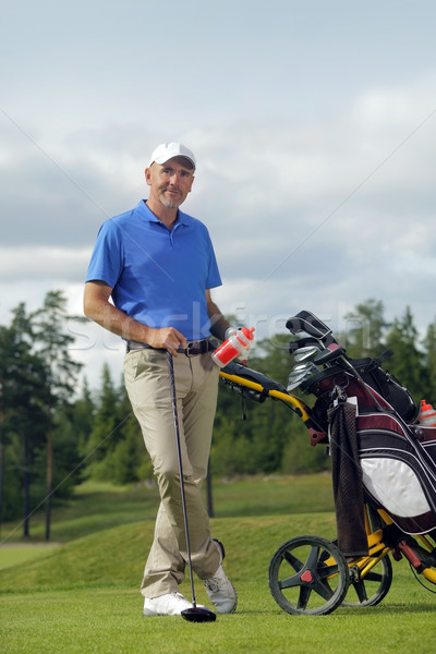 Stockfoto: Man · permanente · golftas · vol · sport · kleur
