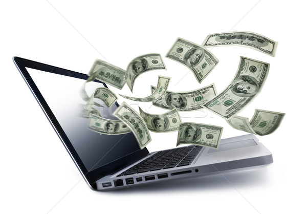 Pénz áramló ki notebook számítógép technológia Stock fotó © mikdam