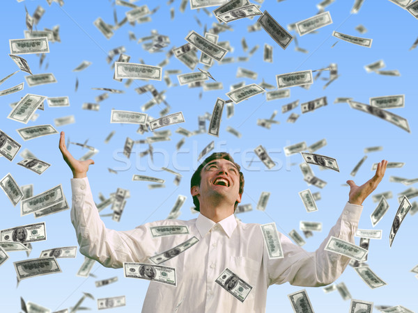 Hombre caer dólares dinero azul Foto stock © mike_kiev