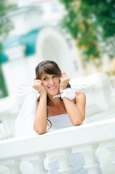 Nachdenklich lächelt Braut weißen Kleid verträumt Lächeln Stock foto © mikhail_ulyannik