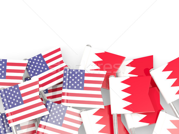 Flag pins of USA and Bahrain isolated on white. 3D illustration Stock photo © MikhailMishchenko