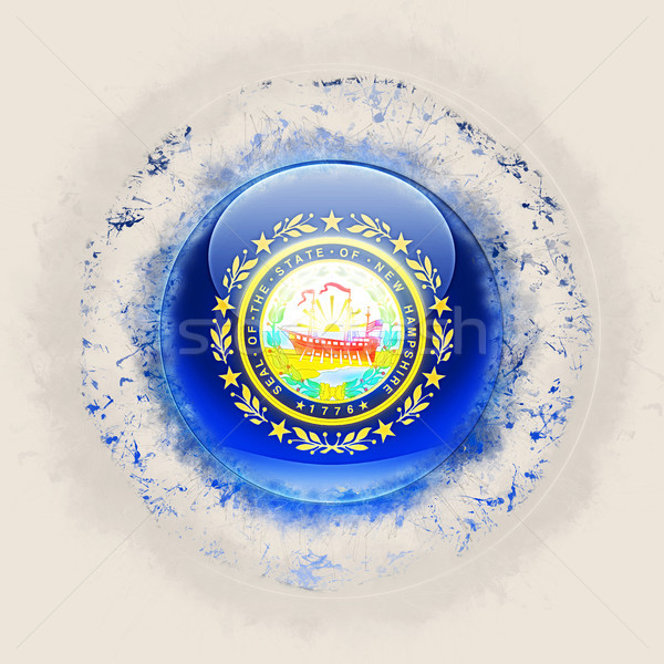 Stock photo: new hampshire state flag on a round grunge icon. United states l