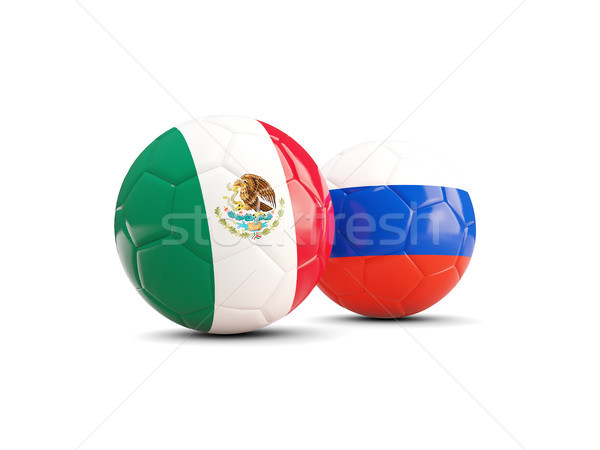 Two footballs with flags of Mexico and Russia isolated on white Stock photo © MikhailMishchenko