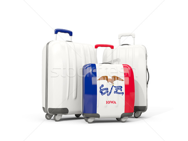 Luggage with flag of iowa. Three bags with united states local f Stock photo © MikhailMishchenko