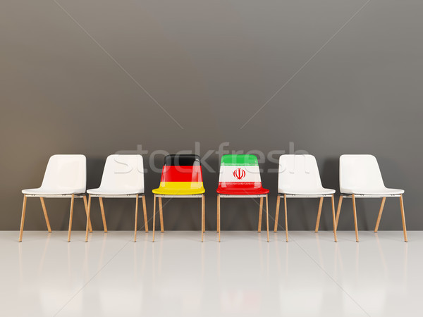 Chairs with flag of Germany and iran in a row Stock photo © MikhailMishchenko