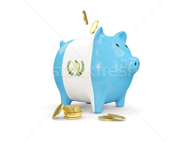 Fat piggy bank with fag of guatemala Stock photo © MikhailMishchenko