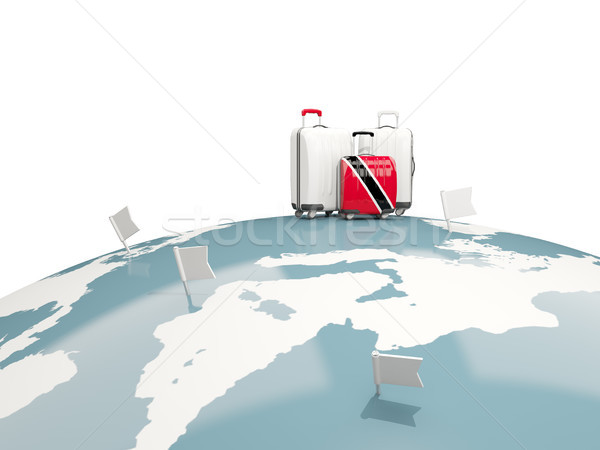 Luggage with flag of trinidad and tobago. Three bags on top of g Stock photo © MikhailMishchenko
