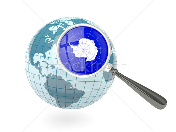 Magnified flag of antarctica with blue globe Stock photo © MikhailMishchenko