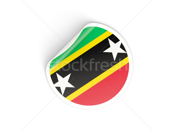 Round sticker with flag of saint kitts and nevis Stock photo © MikhailMishchenko