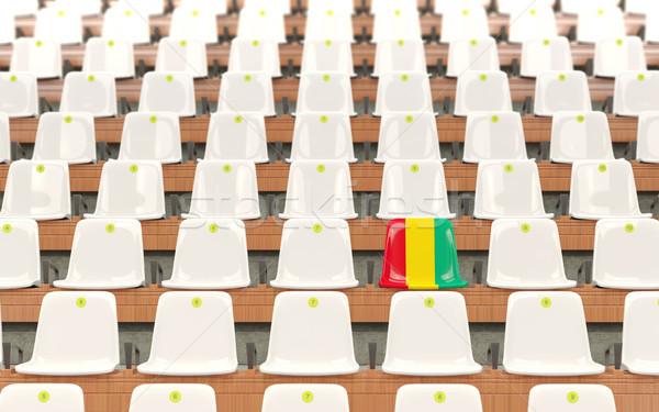 Stock photo: Stadium seat with flag of guinea