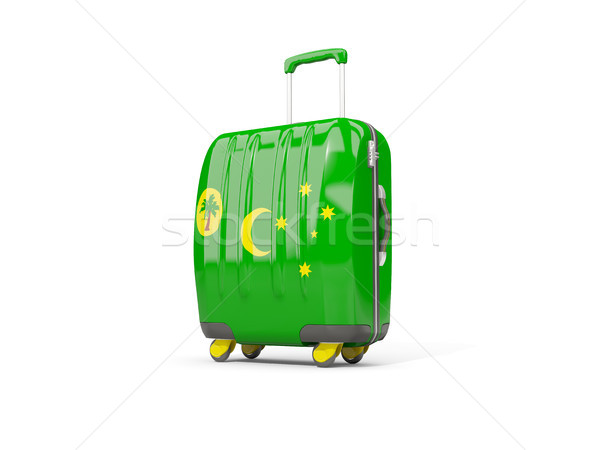 Luggage with flag of cocos islands. Suitcase isolated on white Stock photo © MikhailMishchenko