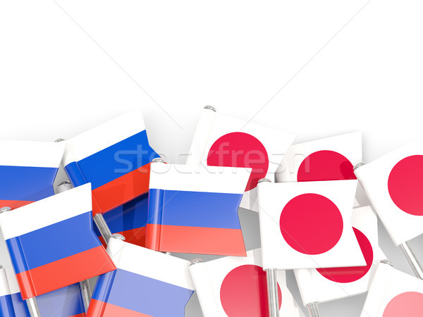 Flag pins of Russia and Japan isolated on white Stock photo © MikhailMishchenko