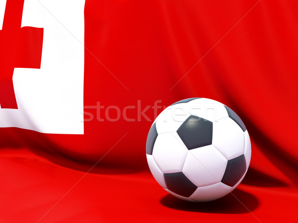 Flag of tonga with football in front of it Stock photo © MikhailMishchenko