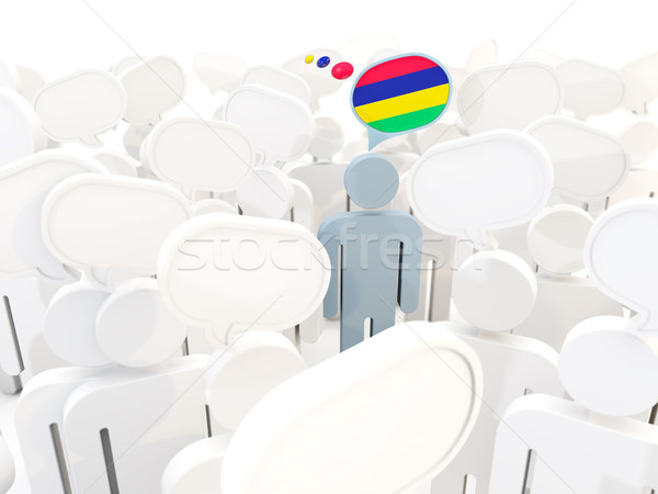 Man with flag of mauritius in a crowd Stock photo © MikhailMishchenko