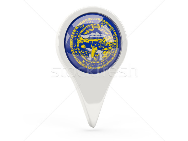 Round flag pin with flag of nebraska. United states local flags Stock photo © MikhailMishchenko